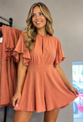 Women's terracotta flutter sleeve romper with keyhole neckline and fitted waist