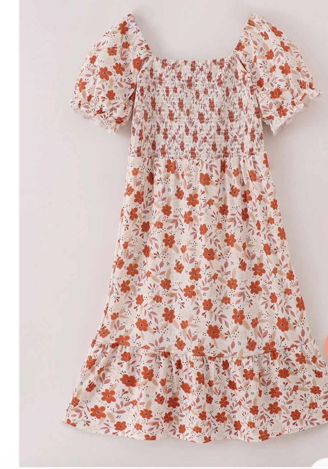 Women's cream floral smocked midi dress with puff sleeves and tiered ruffle hem