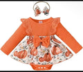 Pumpkin-print girl's fall dress set with orange ribbed top, bow, skirt, and matching headband