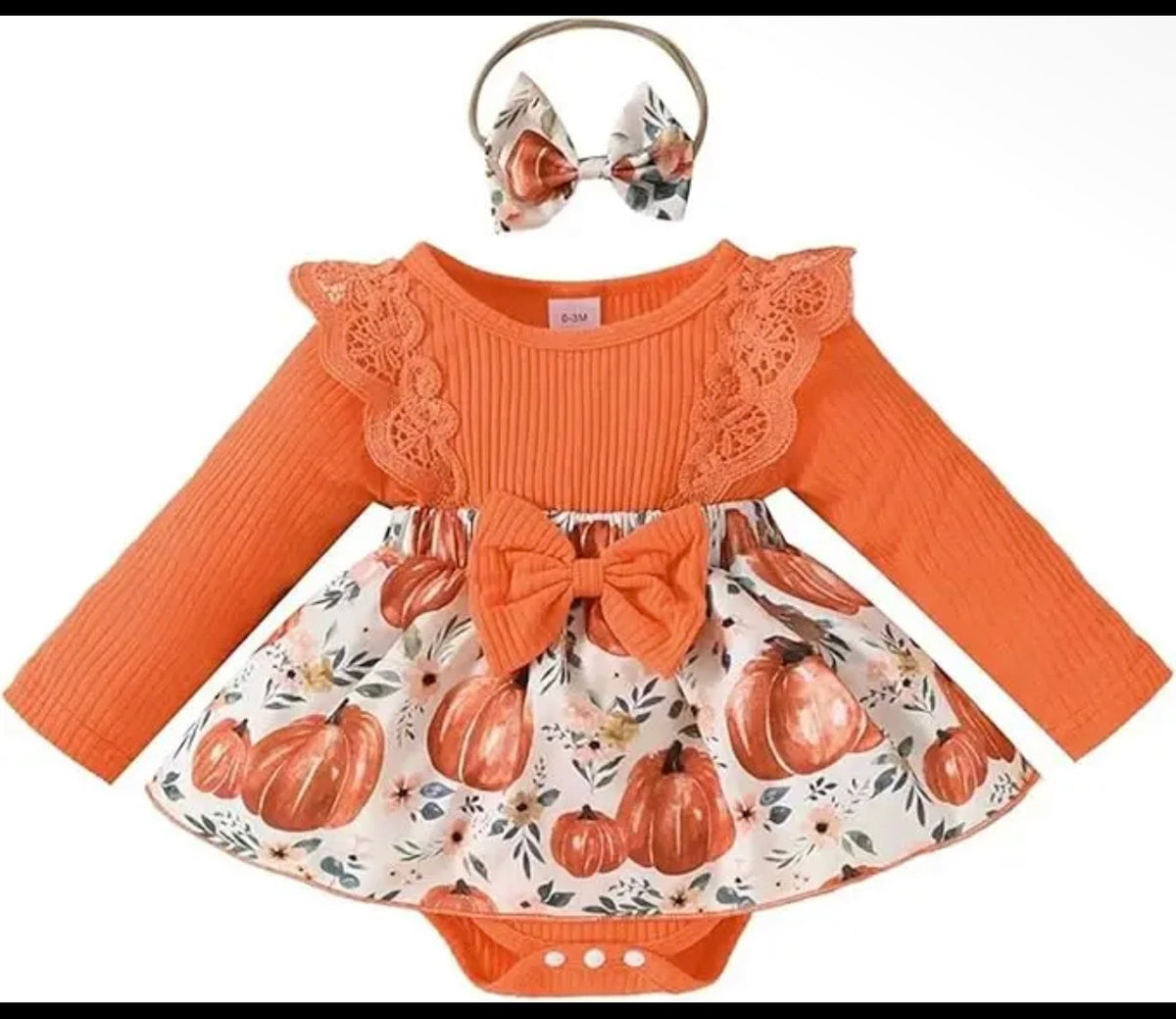Pumpkin-print girl's fall dress set with orange ribbed top, bow, skirt, and matching headband